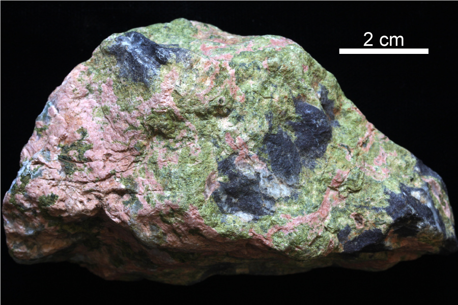 Green mineral in granite