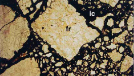 Photomicrograph of fault breccia in the Antietam Formation, Blue Ridge province. Breccias form when rocks are extensively fractured in fault zones and are cemented together when minerals precipitate in the cracks and fractures. Note the angular fragments (fr) of quartz sandstone in a matrix of fine-grained iron oxide cement (ic). Field of View 4 x 2.7 mm, Cross Polarized Light.
